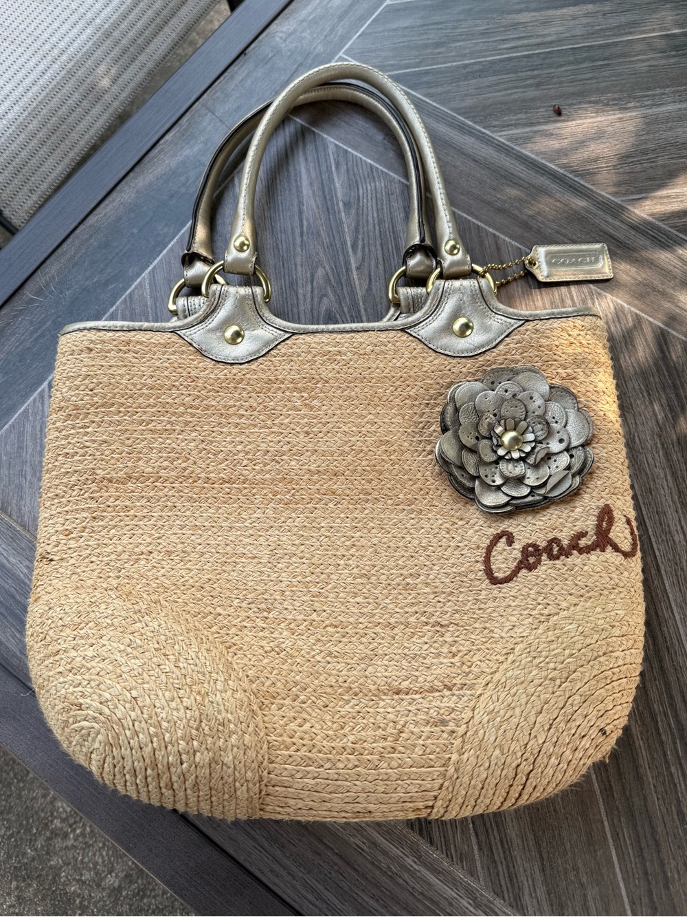 Coach Straw Tote with Metallic Leather Trim and Floral Accent